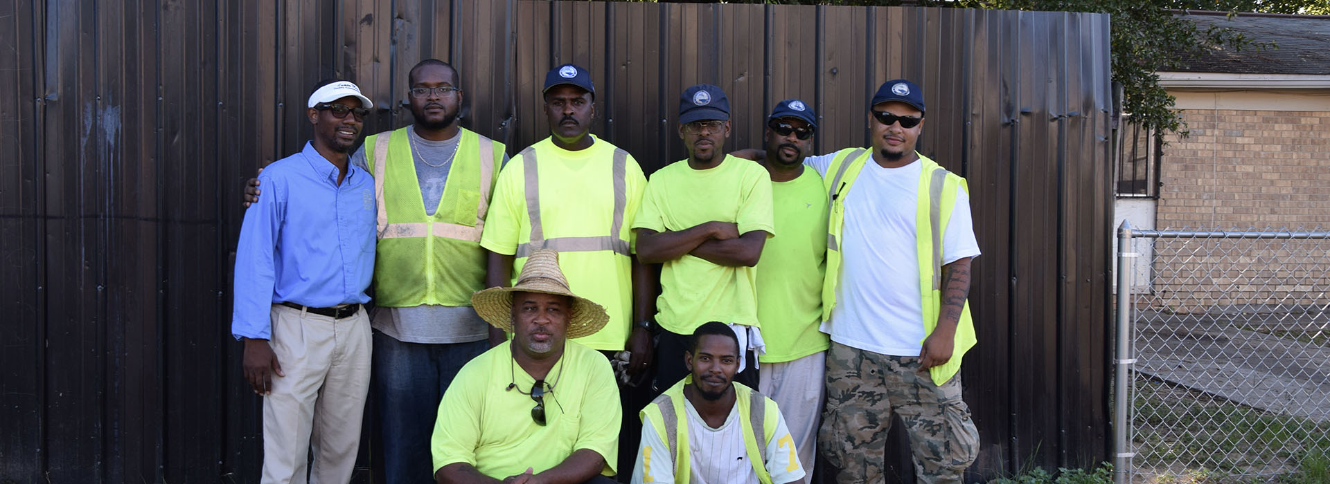 District 3 Commissioner Lumon May with staff