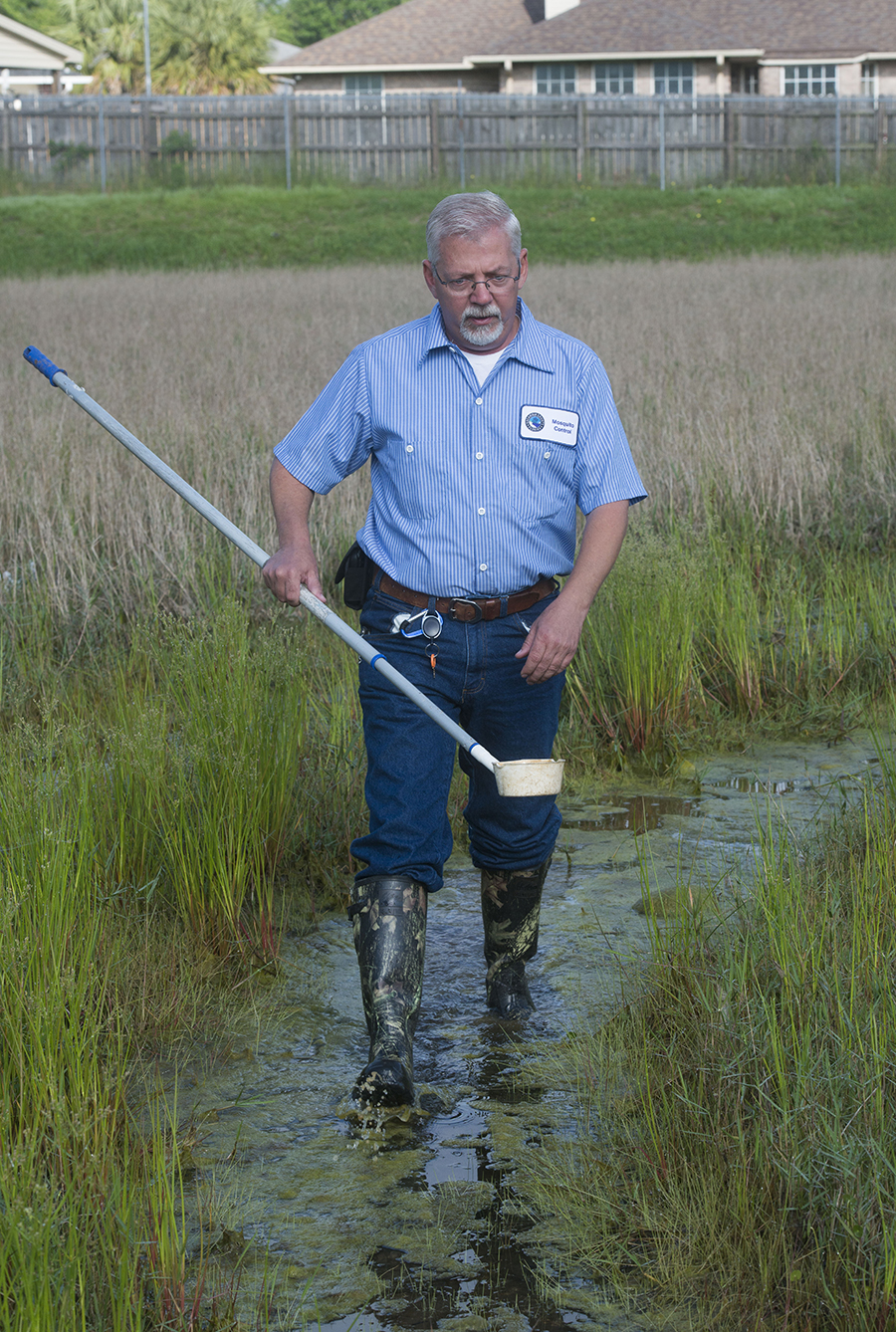 Escambia County Mosquito Control Staff Taking Samples 