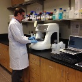 A Staff member Uses a Water Quality Lab AQ1 Nutrient Analyzer