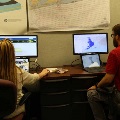 5 - Emergency Operations Center staff work at the EOC Saturday, Oct. 7, 2017 in preparation for Hurricane Nate.